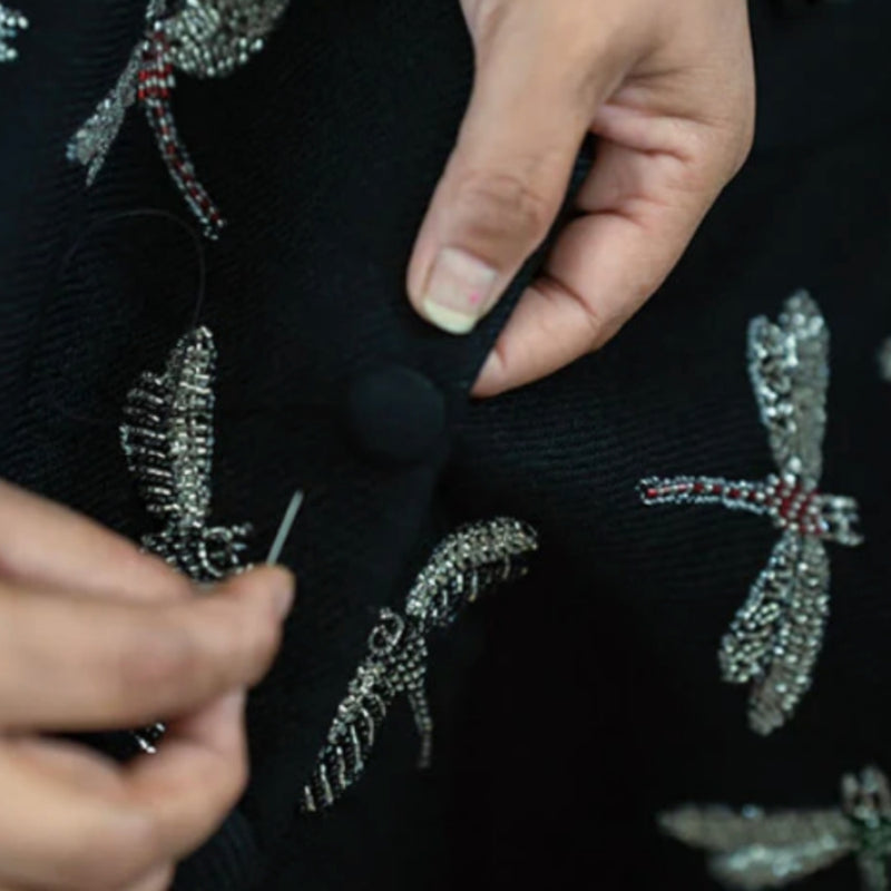 EVERY BEAD PLACED BY HAND